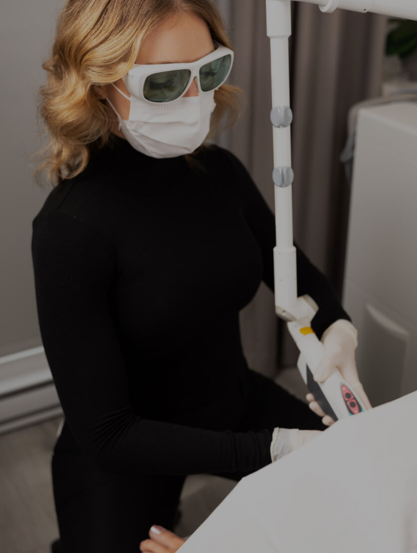 A nurse at Clinique Chloé treating a patient with the Fotona IncontiLase laser for urinary incontinence